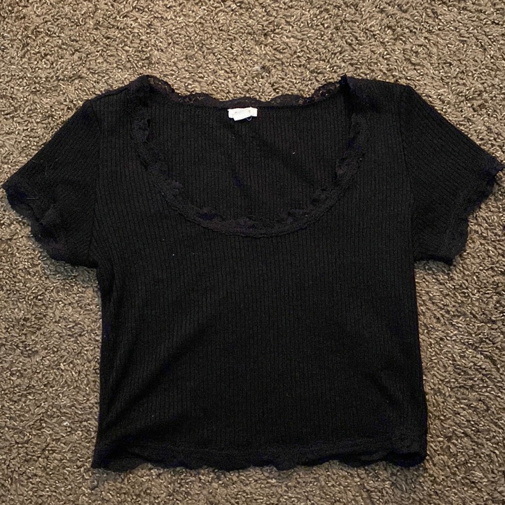Medium black top with lace trimmings from Garage